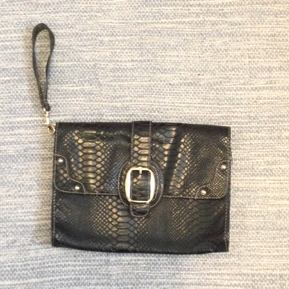 Unique crock face black clutch